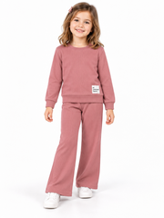 Girl wearing dusty pink Be Awesome Today ribbed co-ord set
