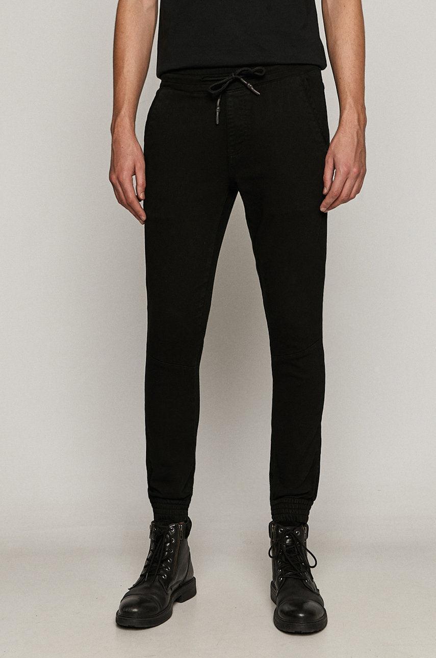 Men's jogger jeans in black knitted denim